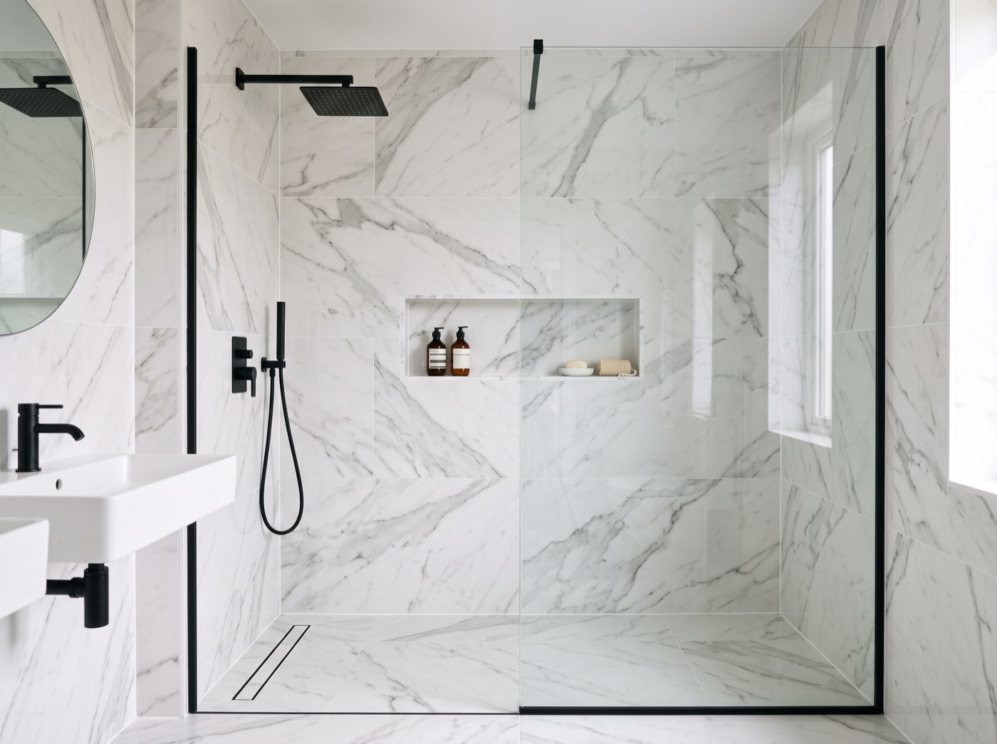 Walk-in shower. Substrate, waterproofing, tiling and glass.